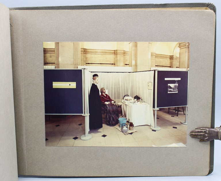 Item #17309 A Century of Health Visiting– an exhibition.] Album of sixteen photos documenting a midwifery and home healthcare exhibit.]. Women's health.