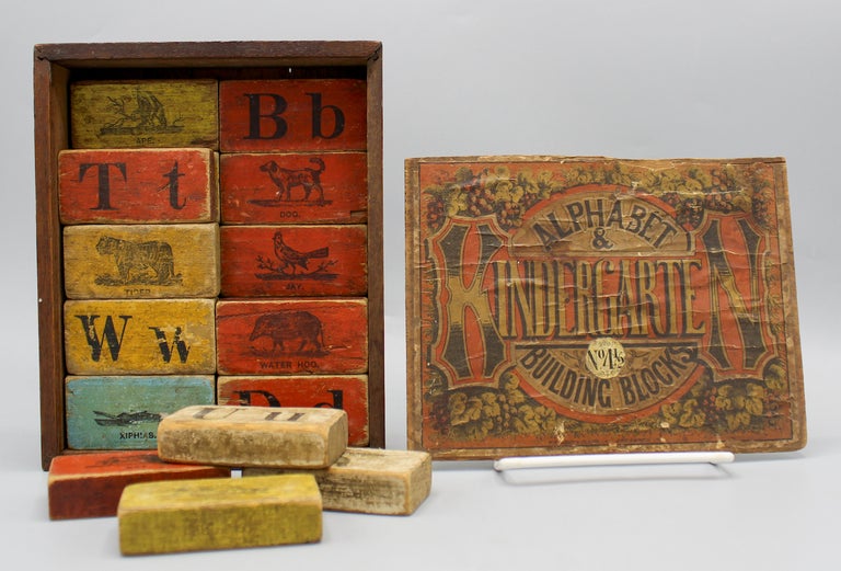 Item #17604 Alphabet & Kindergarten Building Blocks. No. 4 . [Set of twenty Milton Bradley Co. building blocks.]. Froebel Gifts.